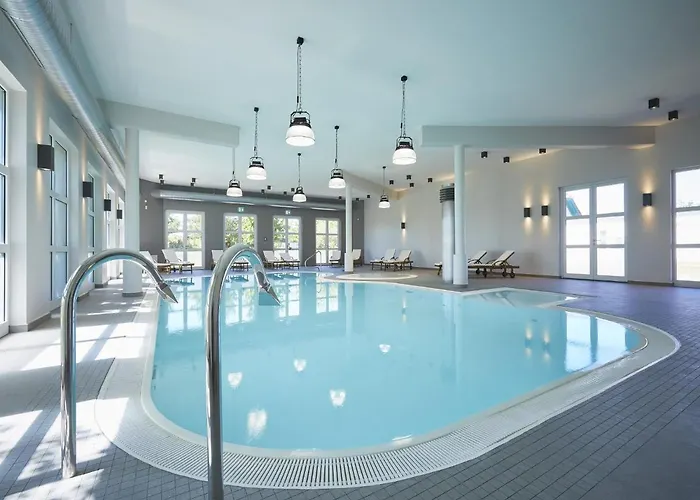 Hébergement de vacances Reetland Am - Premium Reetdachvilla Mit 3 Schlafzimmern, Sauna Und Kamin E08 *